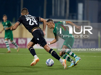 Matias Garcia of Floriana is confronting Toni Borevkovic of Vitoria SC during the UEFA Europa Conference League, Second Qualifying Round, 1s...