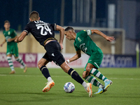 Matias Garcia of Floriana is confronting Toni Borevkovic of Vitoria SC during the UEFA Europa Conference League, Second Qualifying Round, 1s...