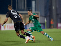 Matias Garcia of Floriana is confronting Toni Borevkovic of Vitoria SC during the UEFA Europa Conference League, Second Qualifying Round, 1s...