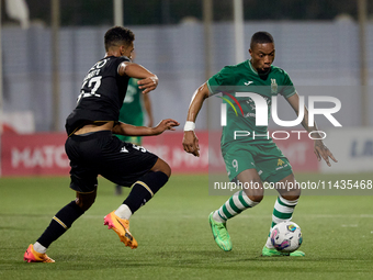 Kemar Reid (R) of Floriana is being closely followed by Baio Alberto (L) of Vitoria SC during the UEFA Europa Conference League, Second Qual...