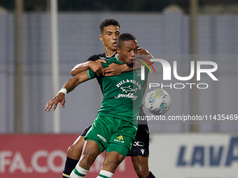 Kemar Reid (front) of Floriana is being closely challenged by Baio Alberto (back) of Vitoria SC during the UEFA Europa Conference League, Se...