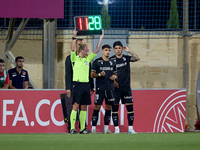 Jose Carlos (2nd L) and Marco Cruz (R) of Vitoria SC are preparing to enter the pitch as substitutes during the UEFA Europa Conference Leagu...