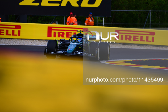 Fernando Alonso of Aston Martin Cognizant F1 Team is driving his single-seater after the free practice of the Belgian GP, the 14th race of t...