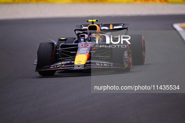 Sergio Perez of Red Bull Racing Honda is driving his single-seater after the free practice of the Belgian GP, the 14th race of the Formula 1...