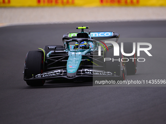 Fernando Alonso of Aston Martin Cognizant F1 Team is driving his single-seater after the free practice of the Belgian GP, the 14th race of t...