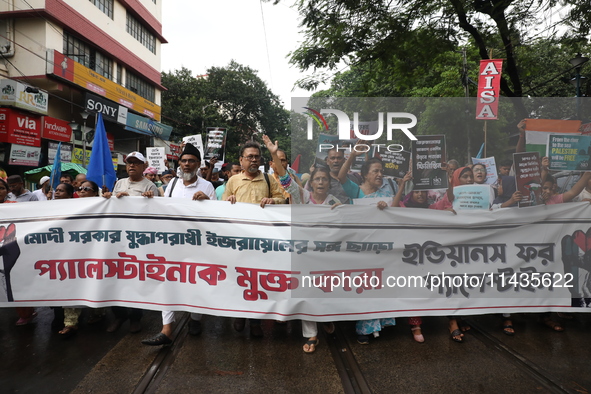 Indians for Palestine group members are shouting slogans during a protest, amid the ongoing conflict in Gaza between Israel and Hamas, in Ko...