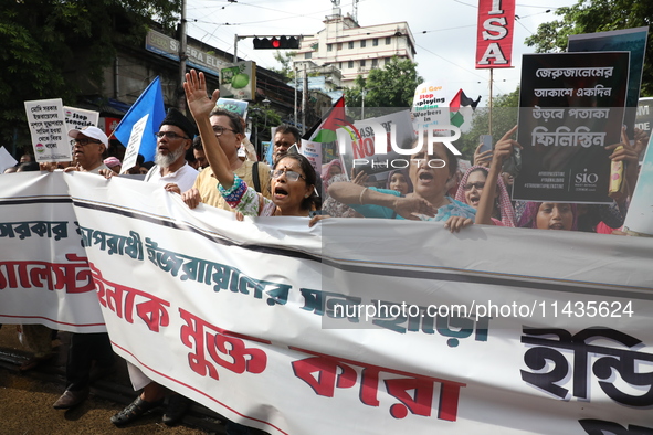 Indians for Palestine group members are shouting slogans during a protest, amid the ongoing conflict in Gaza between Israel and Hamas, in Ko...