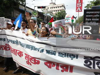 Indians for Palestine group members are shouting slogans during a protest, amid the ongoing conflict in Gaza between Israel and Hamas, in Ko...