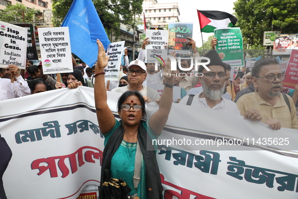 Indians for Palestine group members are shouting slogans during a protest, amid the ongoing conflict in Gaza between Israel and Hamas, in Ko...