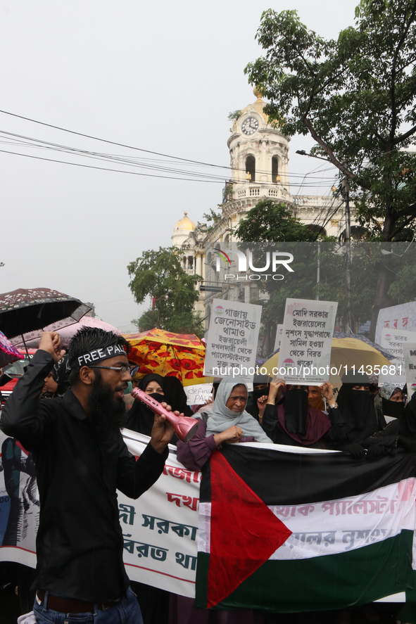 Indian supporters for Palestine are holding posters and the Palestine National Flag during a protest rally, amid the ongoing conflict in Gaz...