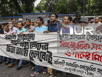 Activists are taking part in a song march to protest against the indiscriminate killings and mass arrests in Dhaka, Bangladesh, on July 26,...