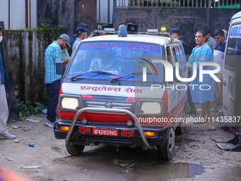 A hearse is carrying the body of a deceased in the Saurya Airlines crash, escorting it to the crematorium after being handed over to the fam...