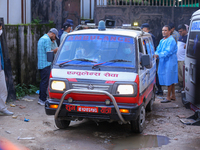 A hearse is carrying the body of a deceased in the Saurya Airlines crash, escorting it to the crematorium after being handed over to the fam...