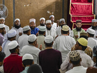 Bangladeshi Muslims are praying at a mosque for the deceased who died in indiscriminate killings and those injured during the anti-quota pro...