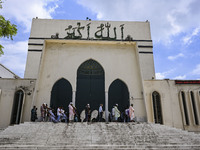 Bangladeshi Muslims are praying at a mosque for the deceased who died in indiscriminate killings and those injured during the anti-quota pro...