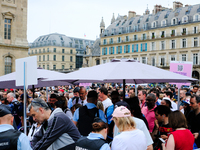 The first spectators of the opening ceremony of the Paris 2024 Olympic Games are passing through the police barrier that is searching every...