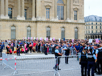 Firefighters are intervening in front of the Louvre Museum with a spectator, while the police are keeping people waiting who have come to at...