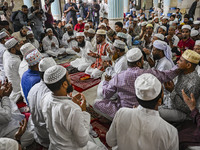 Bangladeshi Muslims are praying at a mosque for the deceased who died in indiscriminate killings and those injured during the anti-quota pro...