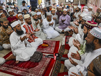 Bangladeshi Muslims are praying at a mosque for the deceased who died in indiscriminate killings and those injured during the anti-quota pro...