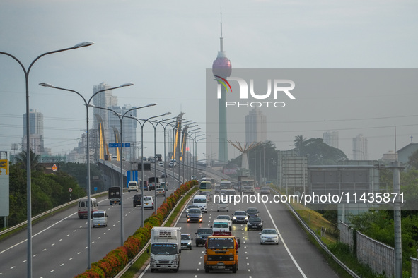 Vehicles are moving on the highway in Colombo, Sri Lanka, on July 26, 2024. 