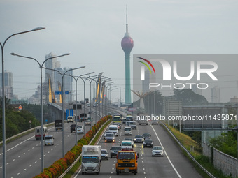 Vehicles are moving on the highway in Colombo, Sri Lanka, on July 26, 2024. (