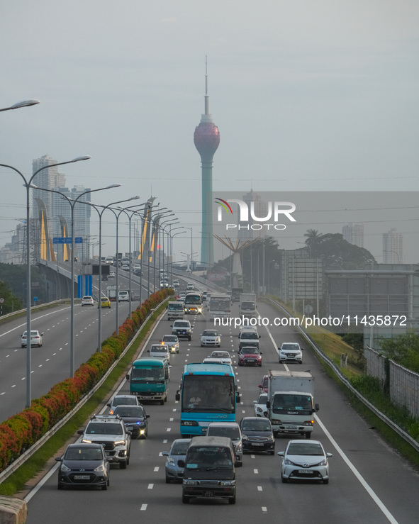 Vehicles are moving on the highway in Colombo, Sri Lanka, on July 26, 2024. 