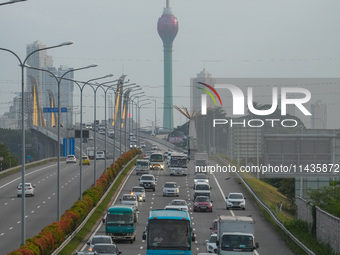 Vehicles are moving on the highway in Colombo, Sri Lanka, on July 26, 2024. (