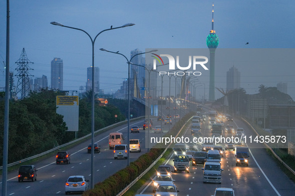 Vehicles are moving on the highway in Colombo, Sri Lanka, on July 26, 2024. 