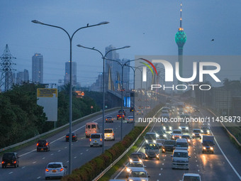 Vehicles are moving on the highway in Colombo, Sri Lanka, on July 26, 2024. (