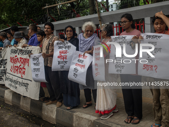 People are taking part in a song march to protest against the indiscriminate killings and mass arrests in Dhaka, Bangladesh, on July 26, 202...