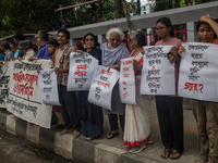 People are taking part in a song march to protest against the indiscriminate killings and mass arrests in Dhaka, Bangladesh, on July 26, 202...