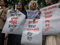 People are taking part in a song march to protest against the indiscriminate killings and mass arrests in Dhaka, Bangladesh, on July 26, 202...