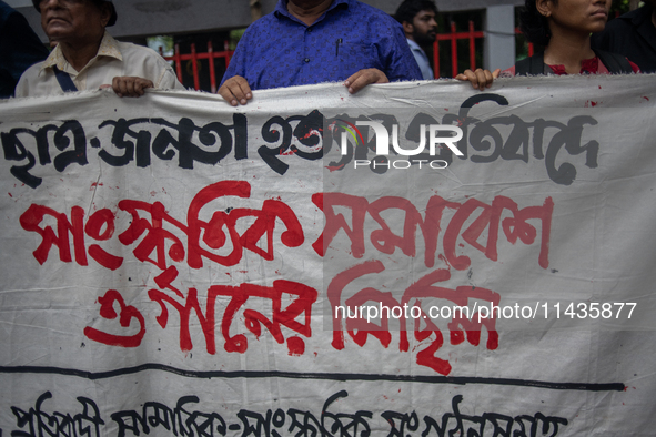 People are taking part in a song march to protest against the indiscriminate killings and mass arrests in Dhaka, Bangladesh, on July 26, 202...