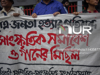 People are taking part in a song march to protest against the indiscriminate killings and mass arrests in Dhaka, Bangladesh, on July 26, 202...