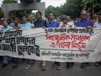 People are taking part in a song march to protest against the indiscriminate killings and mass arrests in Dhaka, Bangladesh, on July 26, 202...