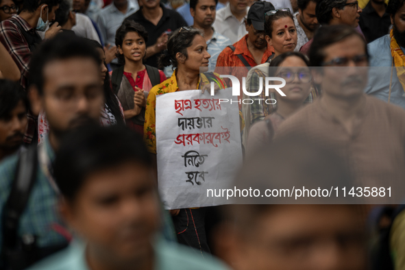 People are taking part in a song march to protest against the indiscriminate killings and mass arrests in Dhaka, Bangladesh, on July 26, 202...