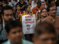 People are taking part in a song march to protest against the indiscriminate killings and mass arrests in Dhaka, Bangladesh, on July 26, 202...