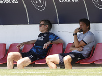 Antonio Conte, coach of Napoli, is working with Gabriele Oriali during day 2 of the preseason training camp of SSC Napoli at Stadio Patini i...