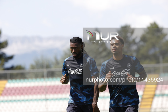 Frank Zambo Anguissa of Napoli and Cyril Ngonge of Napoli are participating in day 2 of the preseason training camp of SSC Napoli at Stadio...