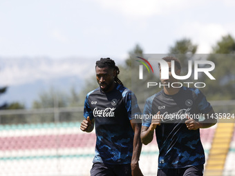 Frank Zambo Anguissa of Napoli and Cyril Ngonge of Napoli are participating in day 2 of the preseason training camp of SSC Napoli at Stadio...