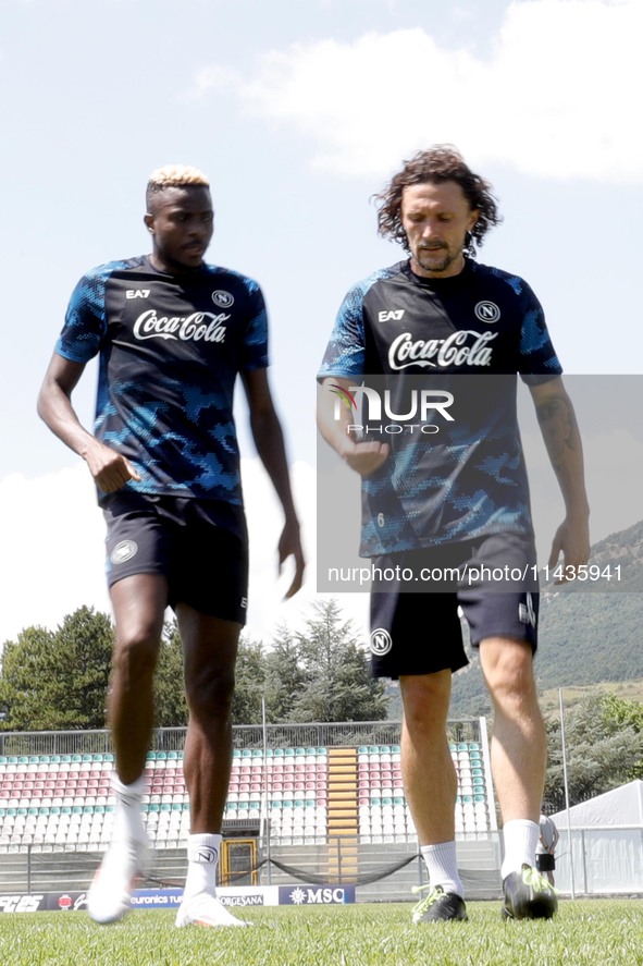 Victor Osimhen of Napoli and Mario Rui of Napoli are participating in day 2 of the preseason training camp of SSC Napoli at Stadio Patini in...