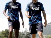 Victor Osimhen of Napoli and Mario Rui of Napoli are participating in day 2 of the preseason training camp of SSC Napoli at Stadio Patini in...