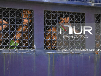 A police van is transporting protesters to the jail after their court hearing in Dhaka, Bangladesh, on July 26, 2024. The number of arrests...