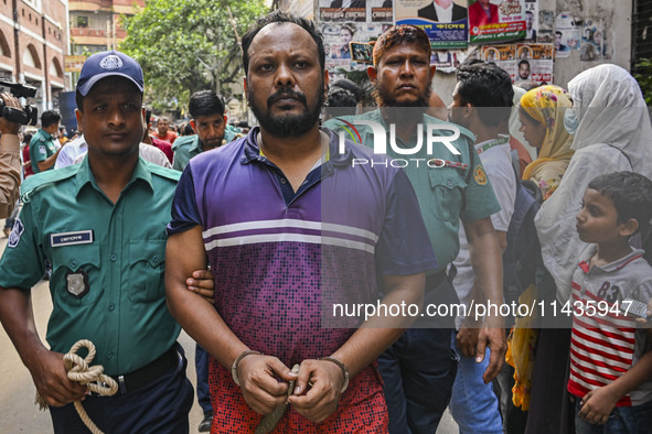 Police are taking protesters to the court after arresting them in Dhaka, Bangladesh, on July 26, 2024. The number of arrests in days of viol...