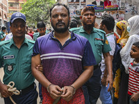 Police are taking protesters to the court after arresting them in Dhaka, Bangladesh, on July 26, 2024. The number of arrests in days of viol...