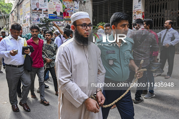 Police are taking protesters to the court after arresting them in Dhaka, Bangladesh, on July 26, 2024. The number of arrests in days of viol...