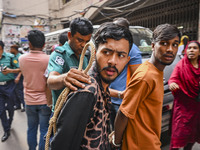 Police are taking protesters to the court after arresting them in Dhaka, Bangladesh, on July 26, 2024. The number of arrests in days of viol...