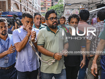 Police are taking protesters to the court after arresting them in Dhaka, Bangladesh, on July 26, 2024. The number of arrests in days of viol...