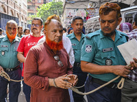 Police are taking protesters to the court after arresting them in Dhaka, Bangladesh, on July 26, 2024. The number of arrests in days of viol...