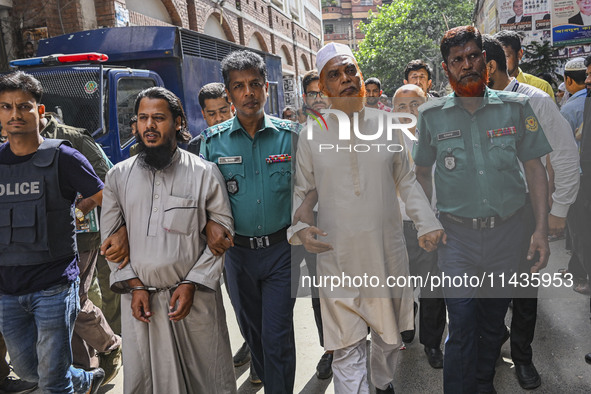 Police are taking protesters to the court after arresting them in Dhaka, Bangladesh, on July 26, 2024. The number of arrests in days of viol...